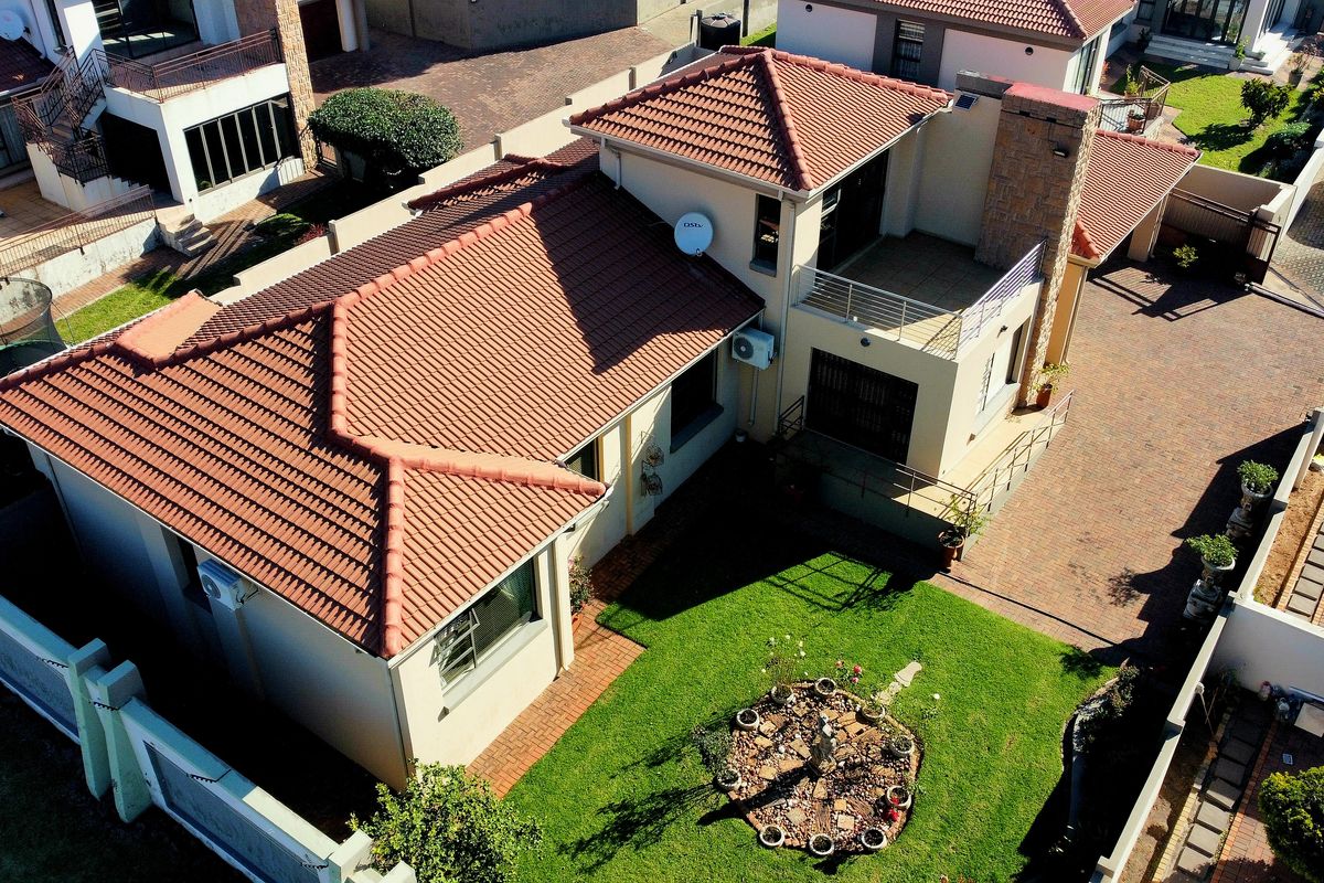 Exquisite Executive Residence | Sophisticated Double-Story Living in a Premier Secure Estate - Photo 5