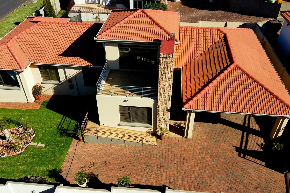 Exquisite Executive Residence | Sophisticated Double-Story Living in a Premier Secure Estate - Photo 3