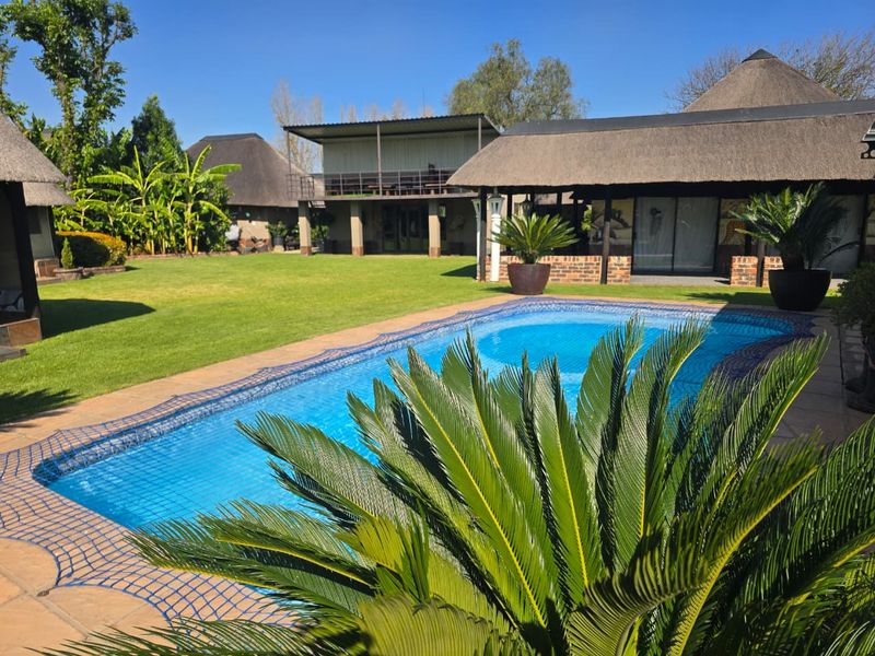 Exceptional Multi-Residence Estate with Wedding Venue & Endless Potential. - Photo 1
