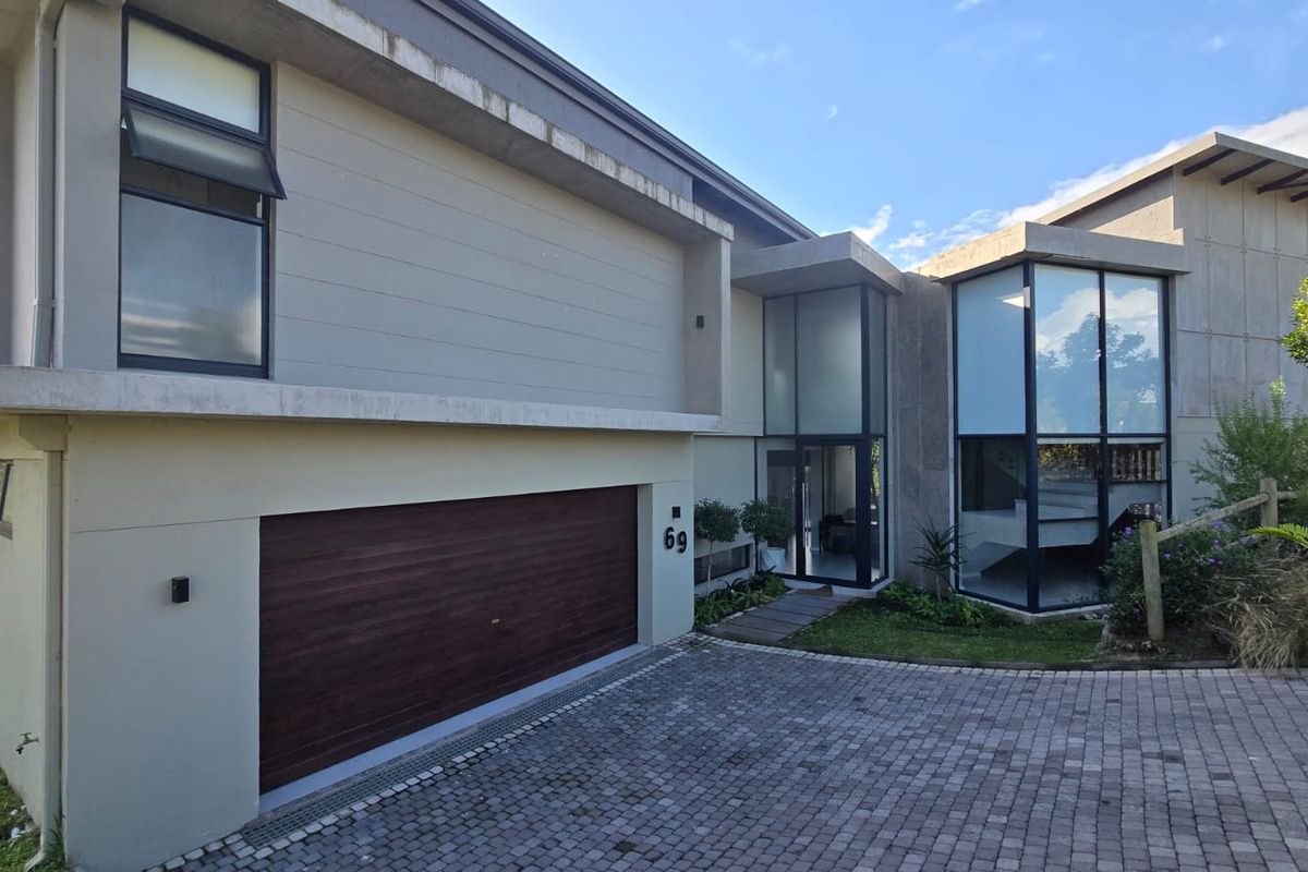 Modern Family Living with Pool & Backup Power in Palm Lakes Estate - Photo 4