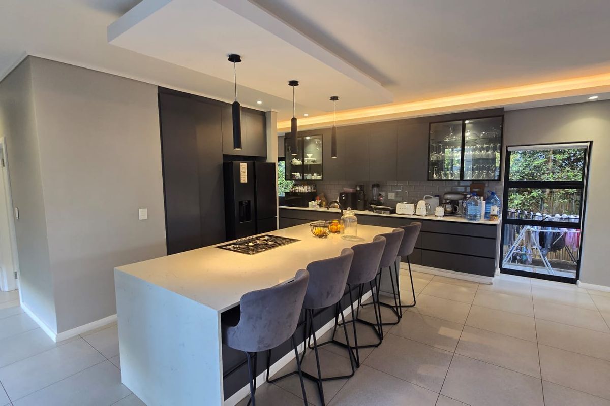 Modern Family Living with Pool & Backup Power in Palm Lakes Estate - Photo 3