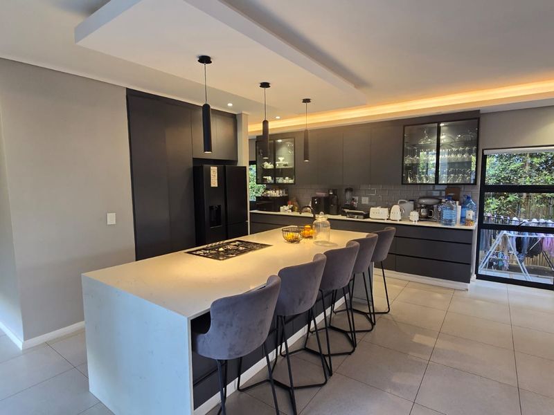 Modern Family Living with Pool & Backup Power in Palm Lakes Estate - Photo 3