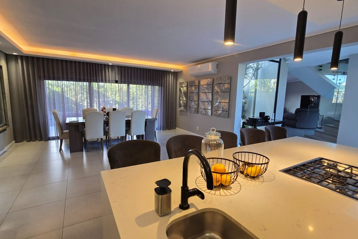 Modern Family Living with Pool & Backup Power in Palm Lakes Estate - Photo 2