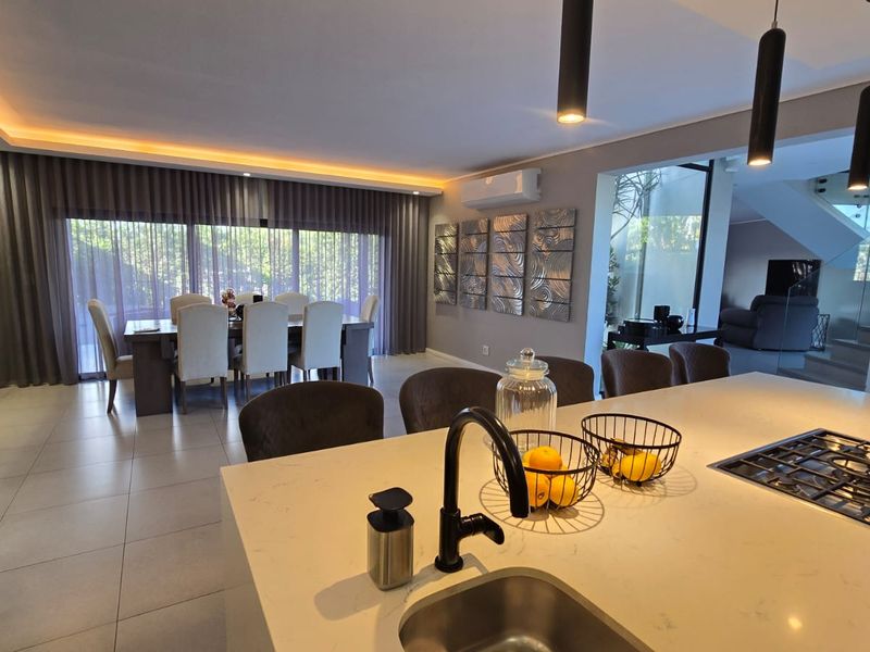 Modern Family Living with Pool & Backup Power in Palm Lakes Estate - Photo 2