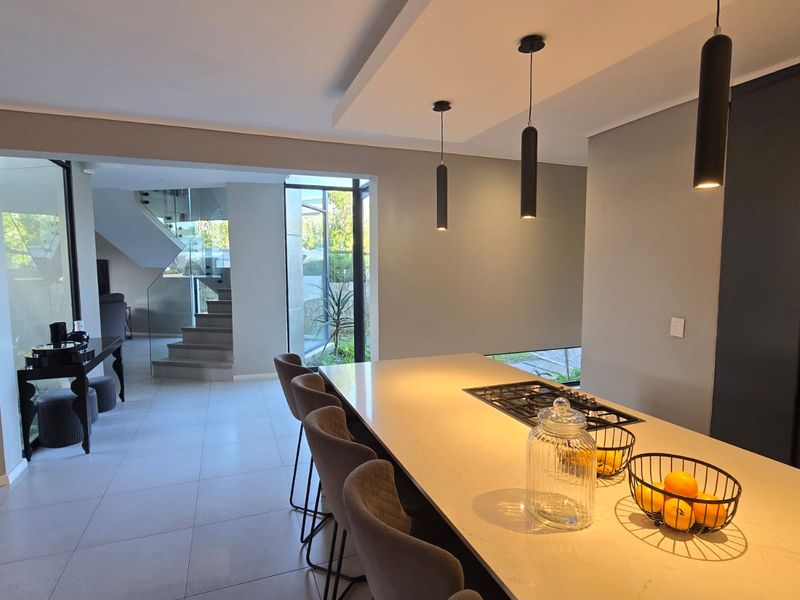 Modern Family Living with Pool & Backup Power in Palm Lakes Estate - Photo 9