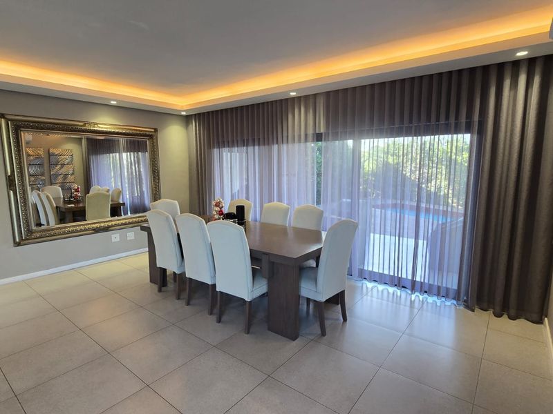 Modern Family Living with Pool & Backup Power in Palm Lakes Estate - Photo 6