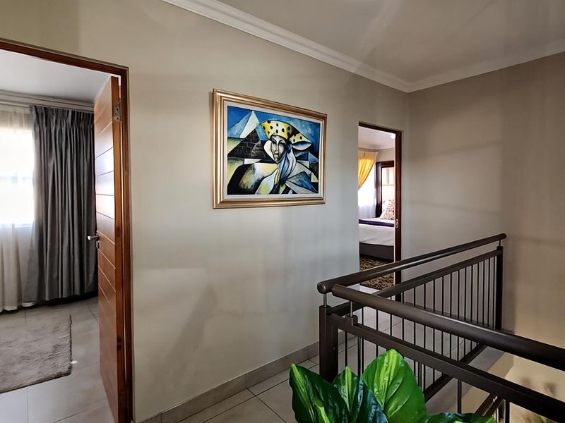 3 Bedrooms | 3 Bathrooms (2 En-Suite) | Gas Fireplace | Patio with Built-in Braai | Double Garage - Photo 10
