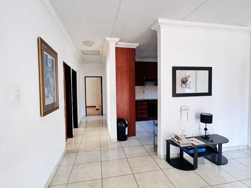 Charming 3 Bedroom Family Home with Spacious Yard and Drive-Through Garage in Ext 18 - Photo 10