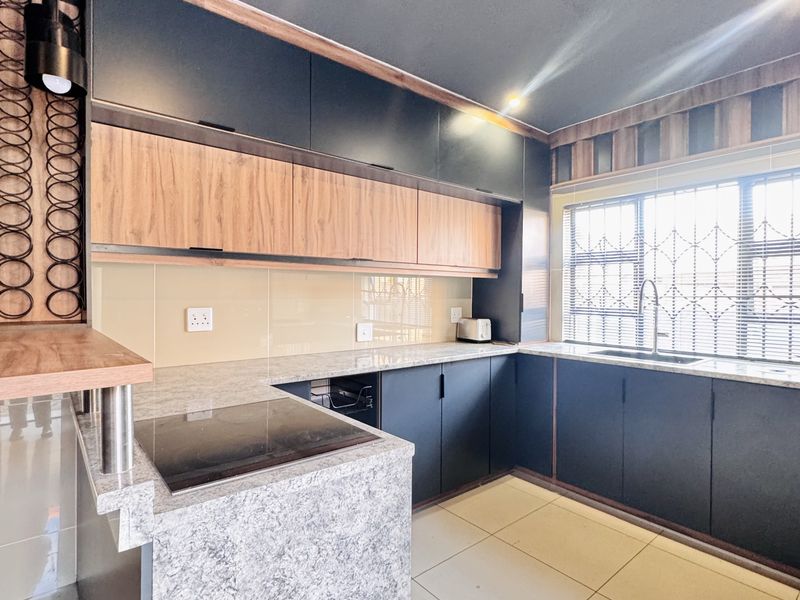 Elegant 5 Bedroom Double-Storey Home with Cinema Room, Office and Premium Security Features - Photo 8
