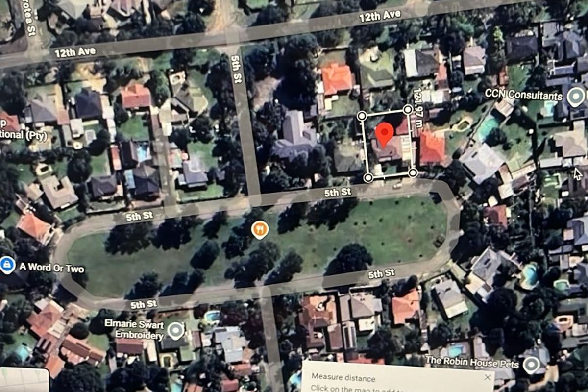 An aerial map view showing the property location within the neighborhood, including surrounding streets and local landmarks.