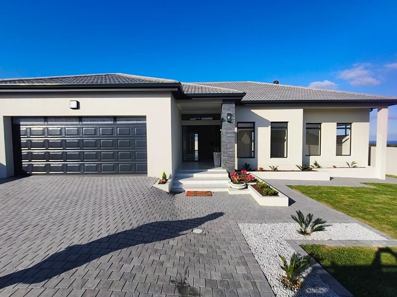 Luxury Coastal Executive Home with Sea Views & Premium Finishes - Photo 1