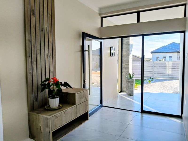 Luxury Coastal Executive Home with Sea Views & Premium Finishes - Photo 4