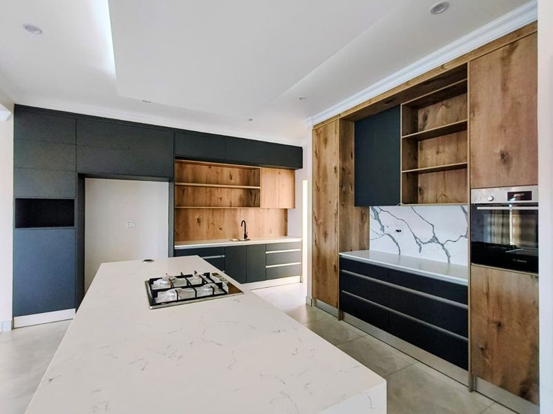 Luxury Coastal Executive Home with Sea Views & Premium Finishes - Photo 8