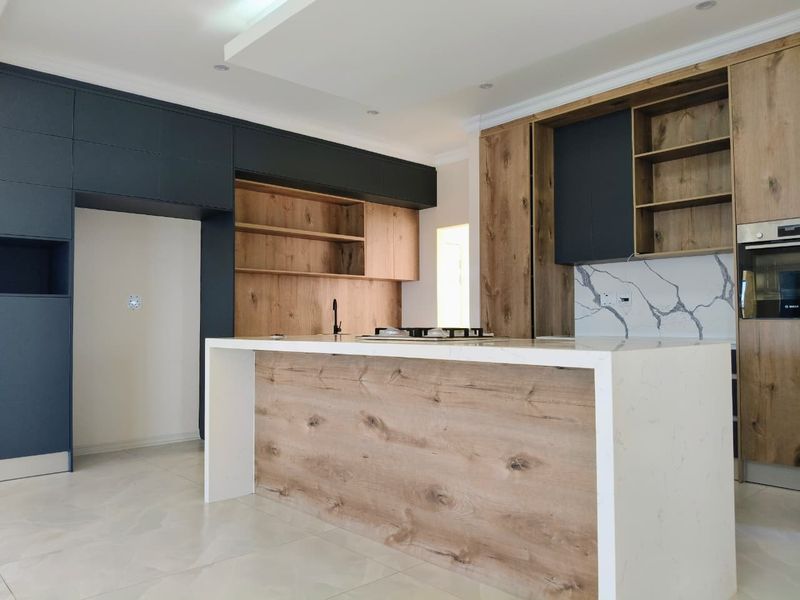 Luxury Coastal Executive Home with Sea Views & Premium Finishes - Photo 7
