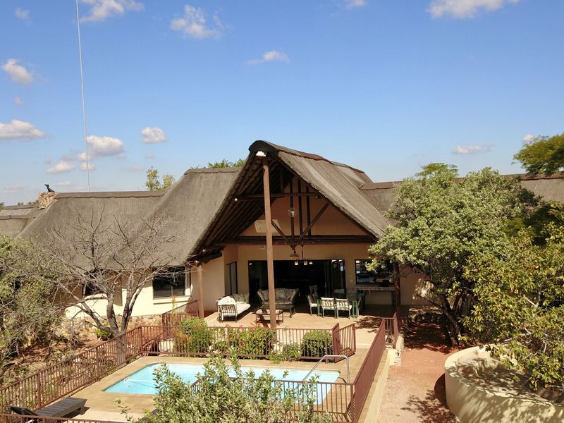 Spectacular Morkels Retreat with Elevated Pool, Panoramic Waterberg Views & Strong Rental Income - Photo 3