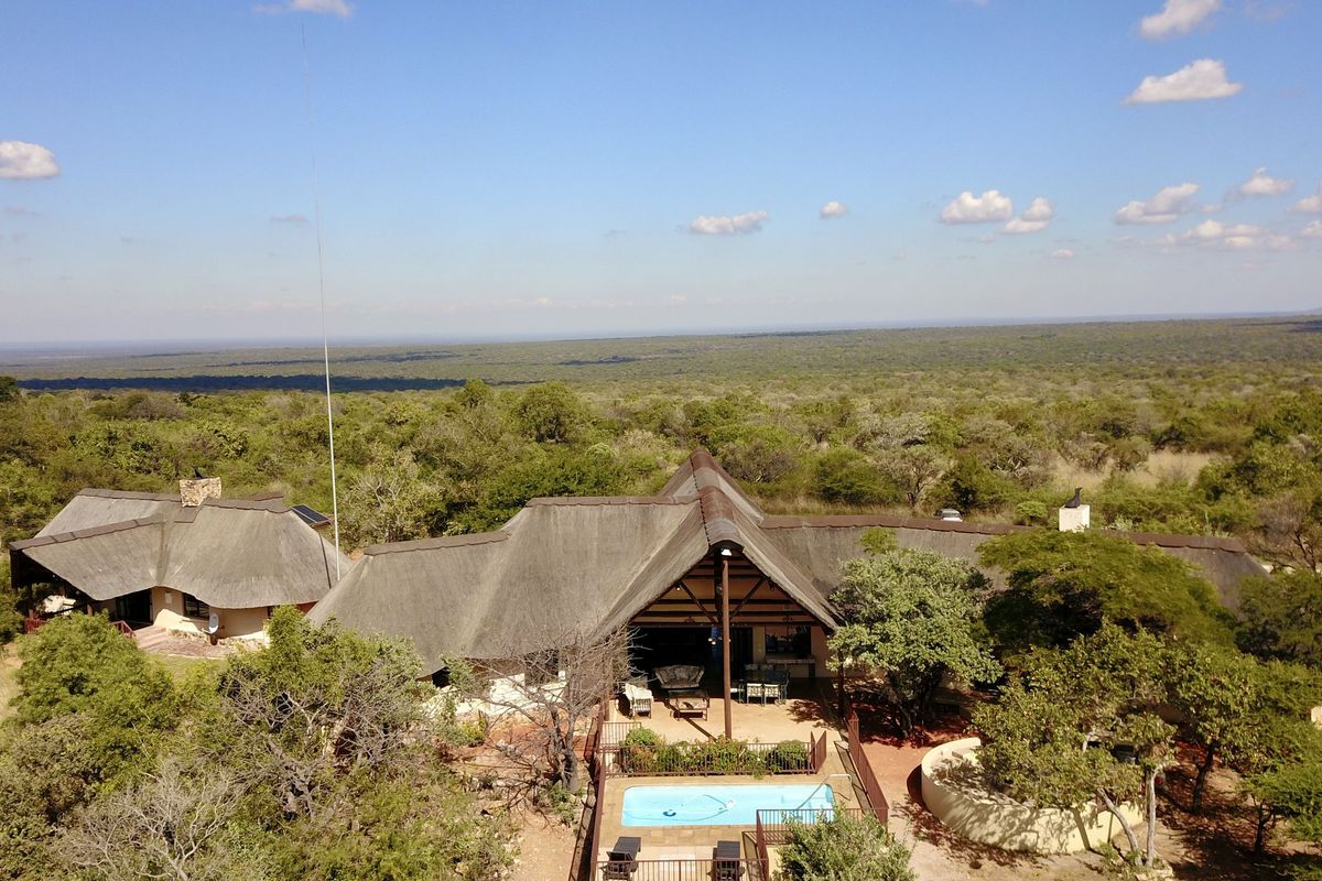 Spectacular Morkels Retreat with Elevated Pool, Panoramic Waterberg Views & Strong Rental Income - Photo 2