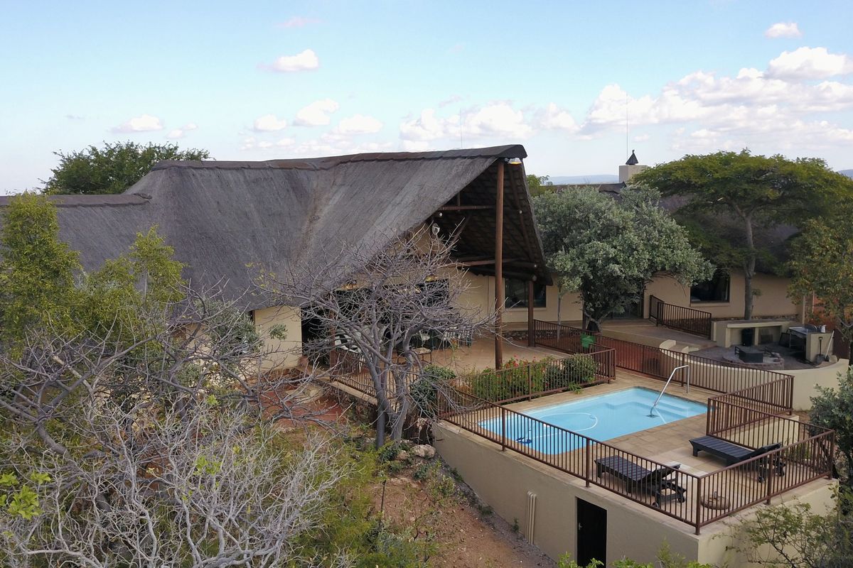 Spectacular Morkels Retreat with Elevated Pool, Panoramic Waterberg Views & Strong Rental Income - Photo 4