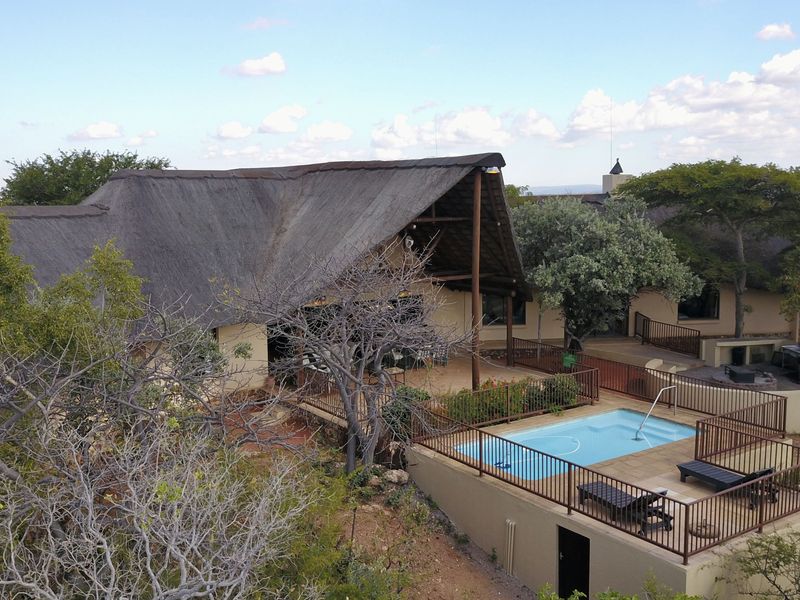 Spectacular Morkels Retreat with Elevated Pool, Panoramic Waterberg Views & Strong Rental Income - Photo 4