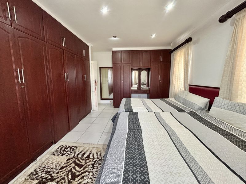 Exceptional Family Home with Granny Flat, Borehole & Extensive Parking - Photo 9
