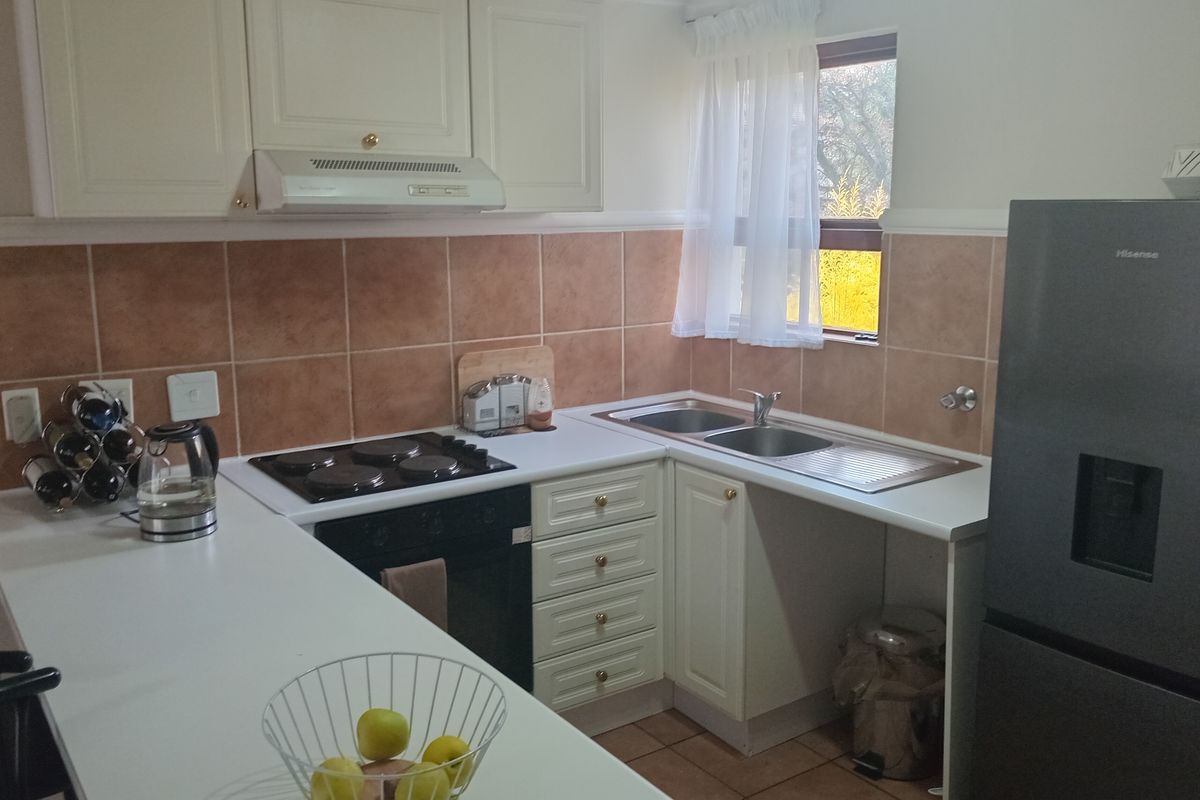 This lovely upstairs unit offers comfortable and versatile living - Photo 2