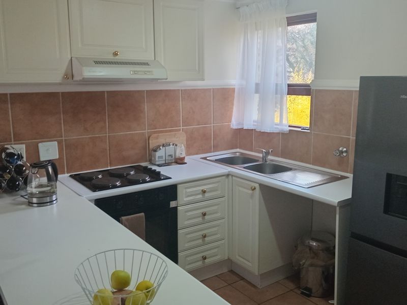 This lovely upstairs unit offers comfortable and versatile living - Photo 2