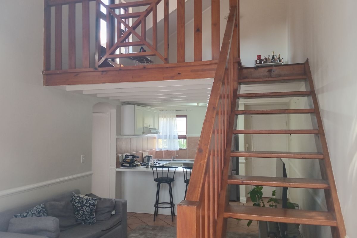 This lovely upstairs unit offers comfortable and versatile living - Photo 5