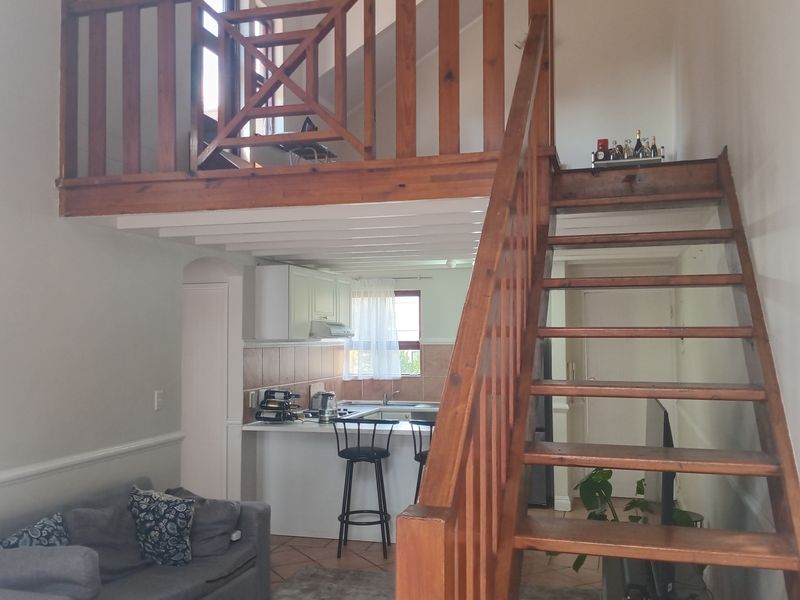 This lovely upstairs unit offers comfortable and versatile living - Photo 5