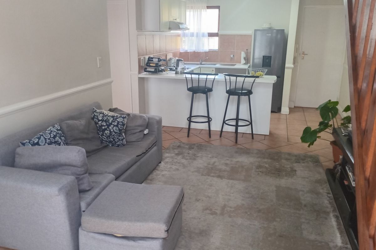 This lovely upstairs unit offers comfortable and versatile living - Photo 3