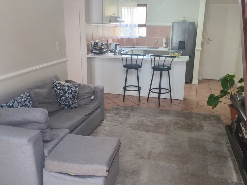 This lovely upstairs unit offers comfortable and versatile living - Photo 3
