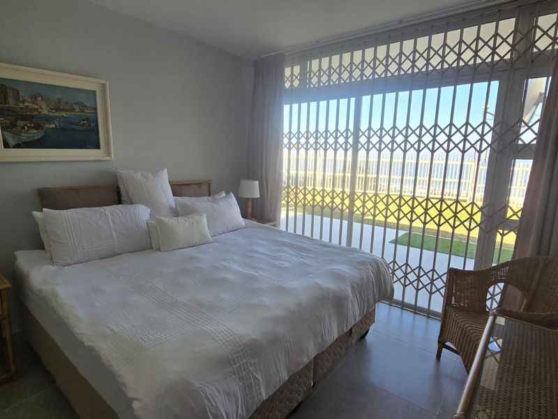 Coastal Living at Its Finest | 3 Bedroom Rental with Direct Beach Access in Compensation Beach - Photo 8