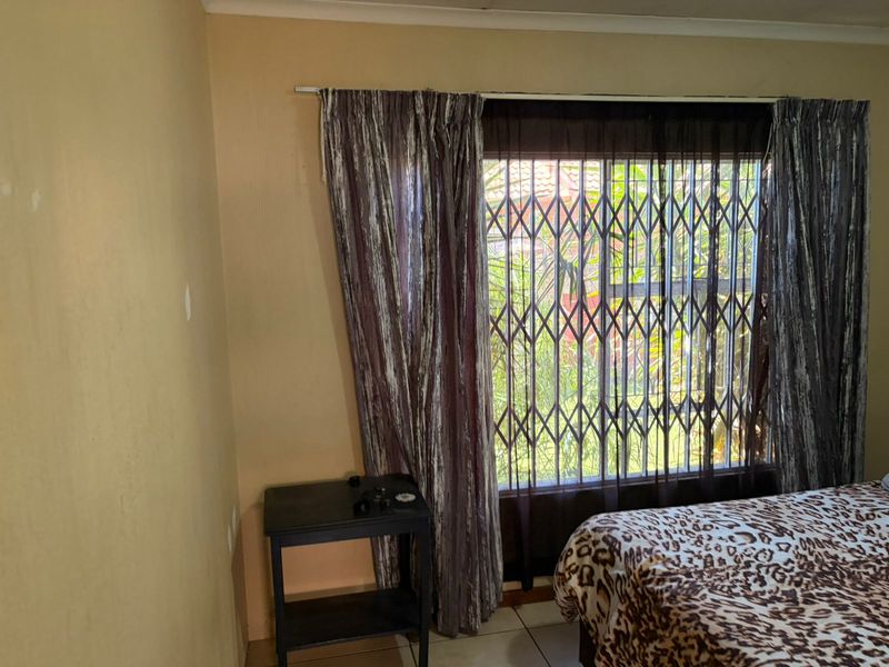 Step into comfort and convenience with this neat and modern sectional title townhouse. - Photo 10