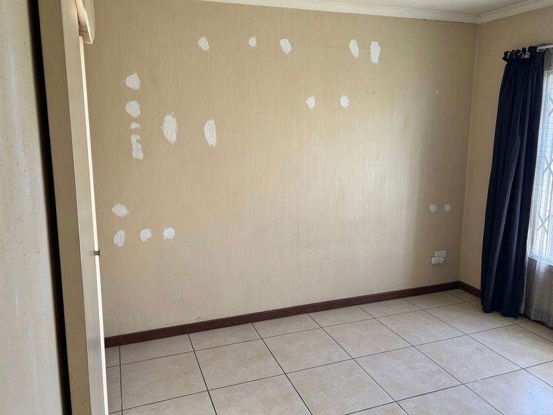 Step into comfort and convenience with this neat and modern sectional title townhouse. - Photo 9