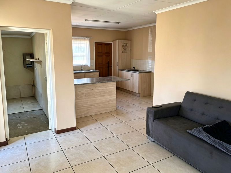 Step into comfort and convenience with this neat and modern sectional title townhouse. - Photo 6