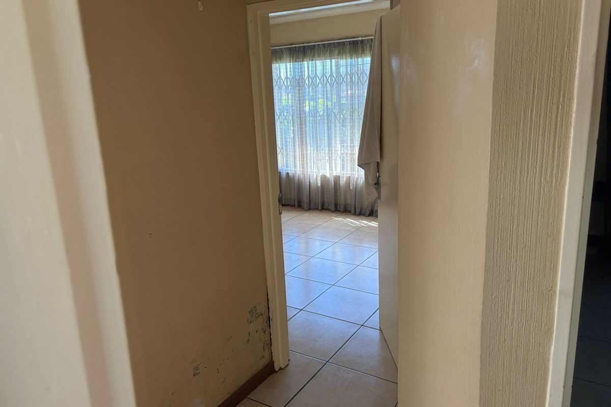 Step into comfort and convenience with this neat and modern sectional title townhouse. - Photo 4