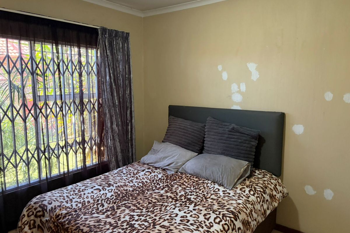 Step into comfort and convenience with this neat and modern sectional title townhouse. - Photo 5