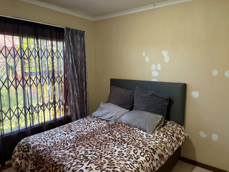 Step into comfort and convenience with this neat and modern sectional title townhouse. - Photo 5