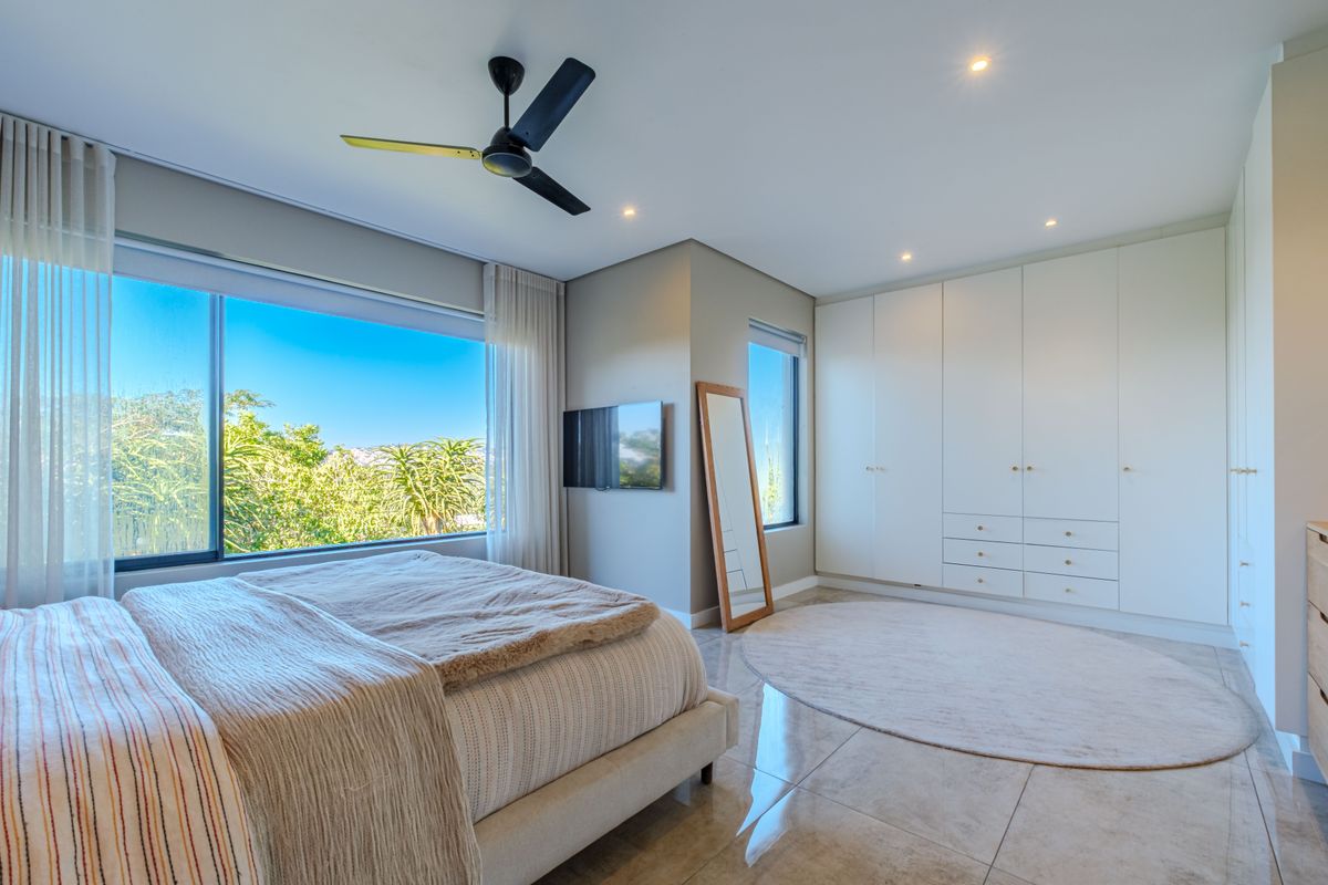 Modern Freestanding Home with Solar, Inverter & Seamless Indoor-Outdoor Living in Simbithi - Photo 5
