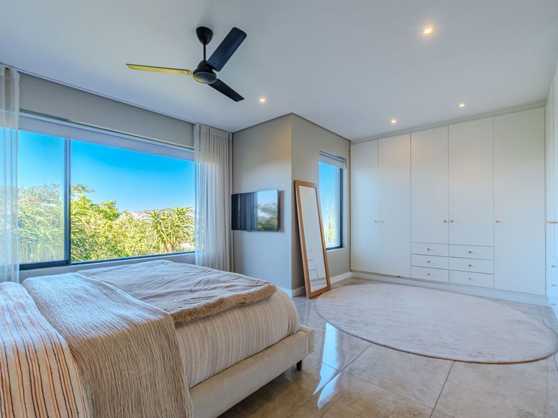 Modern Freestanding Home with Solar, Inverter & Seamless Indoor-Outdoor Living in Simbithi - Photo 5