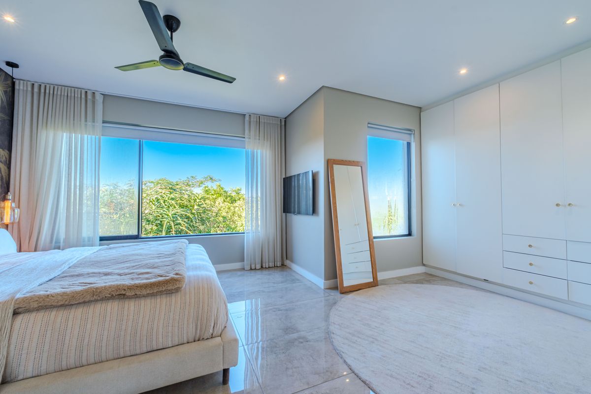 Modern Freestanding Home with Solar, Inverter & Seamless Indoor-Outdoor Living in Simbithi - Photo 4