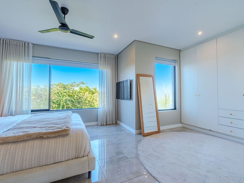 Modern Freestanding Home with Solar, Inverter & Seamless Indoor-Outdoor Living in Simbithi - Photo 4