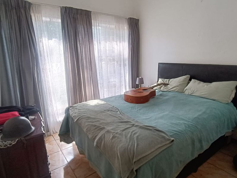 Stunning 3 Bedroom Family Home with Flatlet, Solar & Entertainment Oasis on a Corner Stand - Photo 8