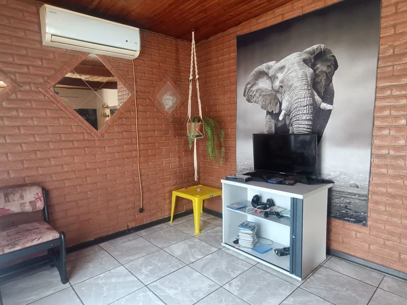 Stunning 3 Bedroom Family Home with Flatlet, Solar & Entertainment Oasis on a Corner Stand - Photo 4