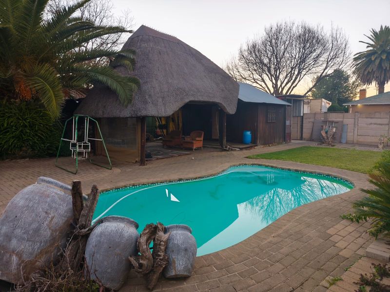 AN EXTRAORDINARY FAMILY RETREAT – SPACE, STYLE & VERSATILITY IN THE HEART OF WILGEHOF - Photo 1