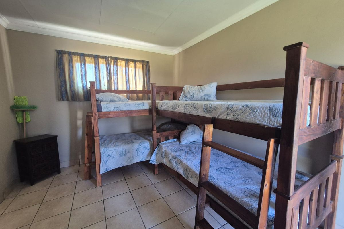Income-Generating Guesthouse | 4 Chalets + Main House | 50-100m from Vaal Dam! - Photo 4