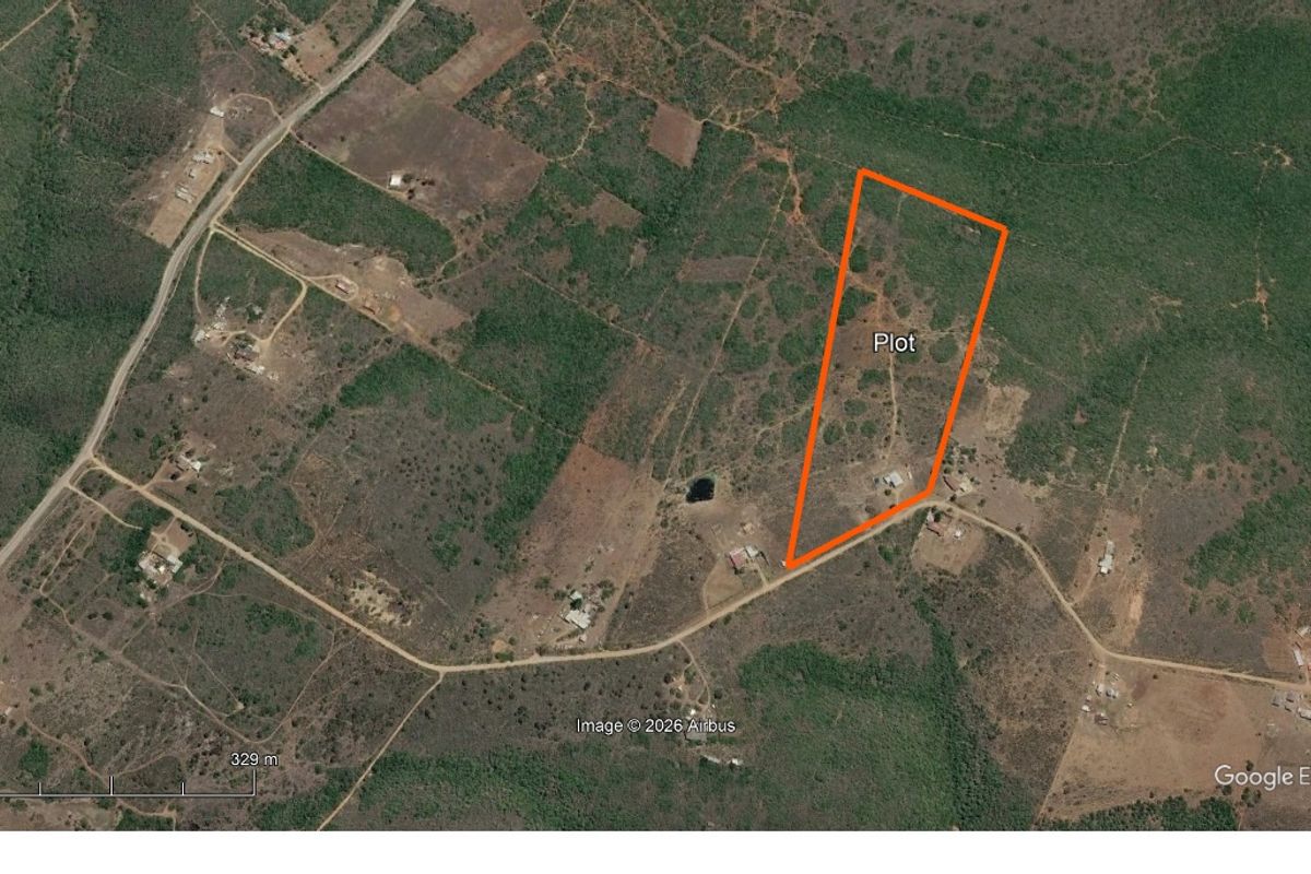 An aerial satellite view showing the boundaries of the land plot within the surrounding rural landscape.