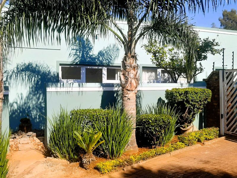Charming 3-Bedroom Home with Guest House Potential in a Secure Estate - Photo 3