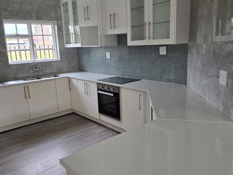Renovated to Impress – Spacious 4-Bedroom Home with Modern Finishes - Photo 3
