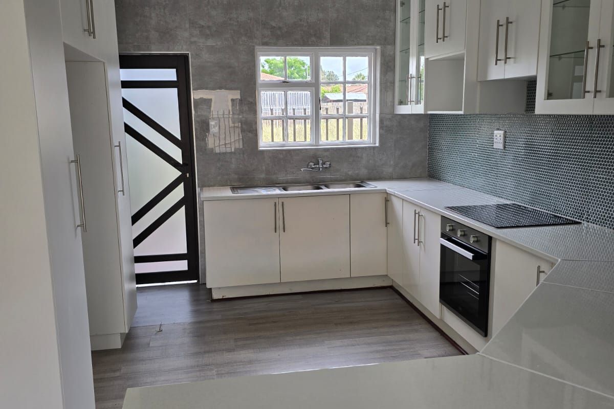 Renovated to Impress – Spacious 4-Bedroom Home with Modern Finishes - Photo 2