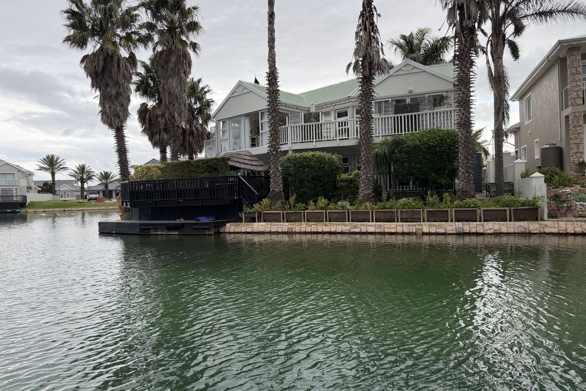Exclusive Canal-Front Living with Space, Style & Exceptional Entertaining - Photo 2