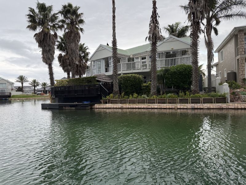 Exclusive Canal-Front Living with Space, Style & Exceptional Entertaining - Photo 2
